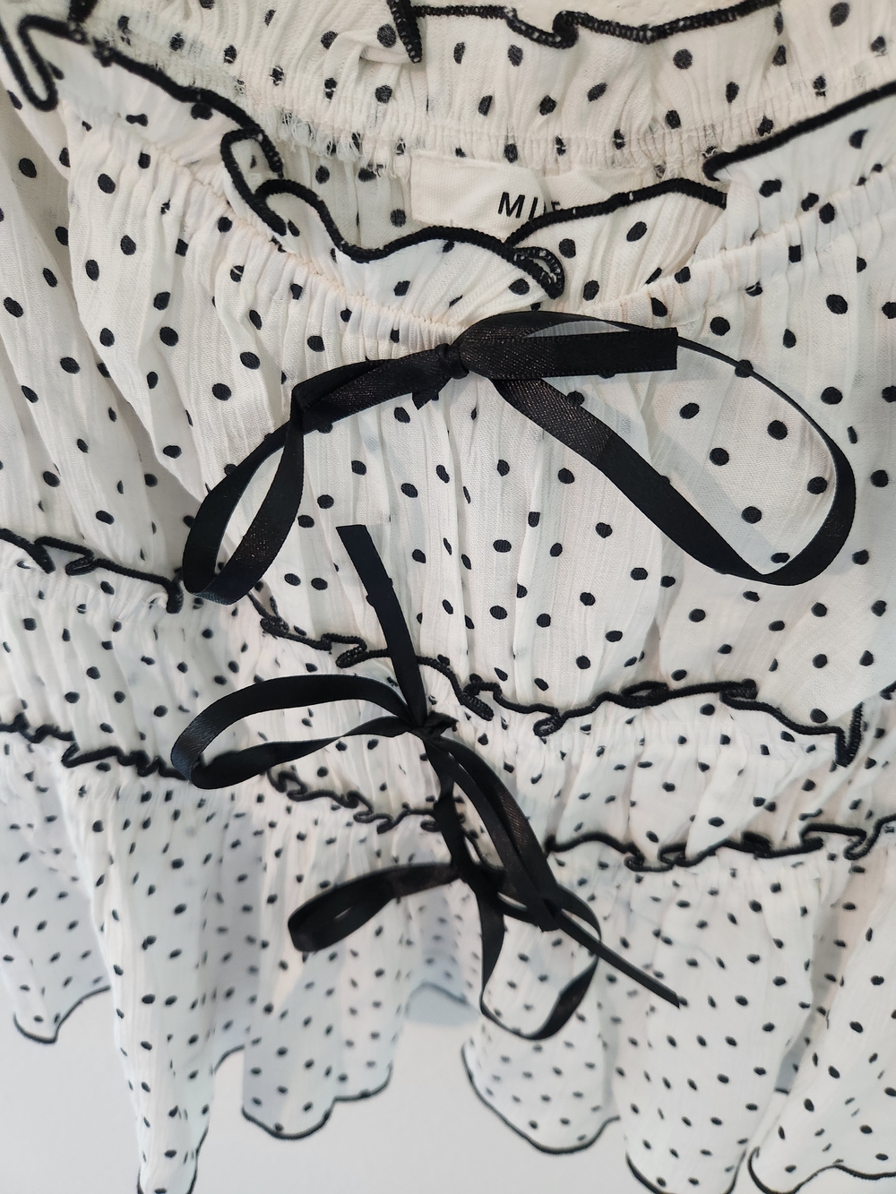 White Polka Dot Baby Doll Ruffle Crop Top with Black Trim And Bows - Picture 4 of 8